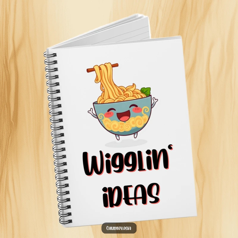 Funny ramen notebook with a cheerful, anthropomorphic bowl of ramen noodles wiggling excitedly, ideal for note-taking.